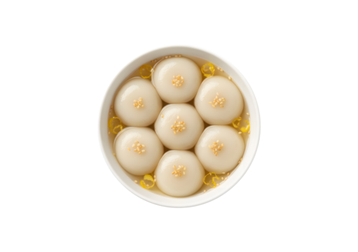 A top view of large tangyuan yuanxiao (also known as yuan xiao tang yuan, glutinous rice dumpling balls) in a bowl, set against a white background, perfect for the Lunar New Year festival.


