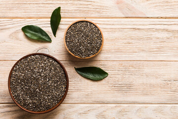 Chia seeds in bowl on colored background. Healthy Salvia hispanica in small bowl. Healthy superfood