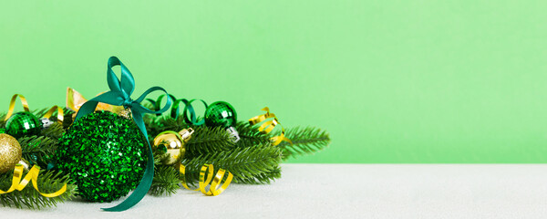 New Year Christmas tree toy, branches of a christmas tree, New Year decorations on a colored background