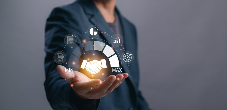 Trusted partner, cooperation, business partners agreeing to work together, businessman showing handshake icon to show level of trust or build good business relationship with virtual hand graphic