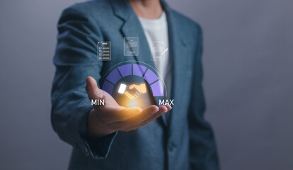 Trusted partner, cooperation, business partners agreeing to work together, businessman showing handshake icon to show level of trust or build good business relationship with virtual graphics