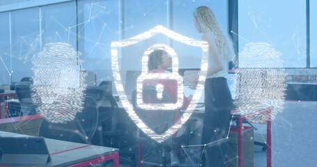 Showing security shield with padlock and fingerprint over office, colleagues in work clothes