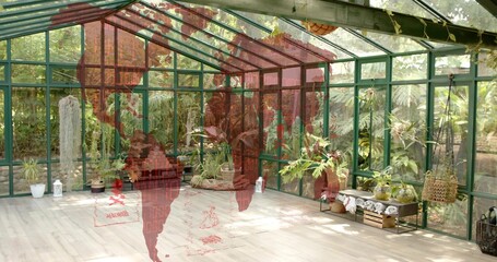 Showing green metal greenhouse displaying potted plants on wood floor, with red map overlay