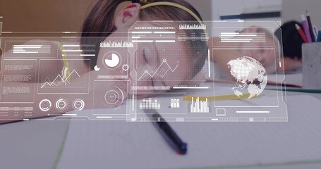 Resting child wearing yellow headband leaning on notebook at desk, with pencil, cup, HUD overlay