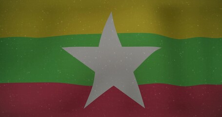 Displaying Myanmar flag, full-frame, yellow green red bands, white star, distressed overlay