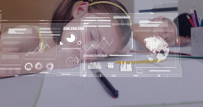 Resting child wearing yellow headband leaning on notebook at desk, with pencil, cup, HUD overlay