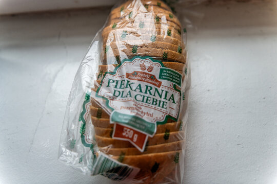 Warsaw, USA - April 10, 2025: Storebought biedronka Polish style loaf of bread Piekarnia regional product natural baked