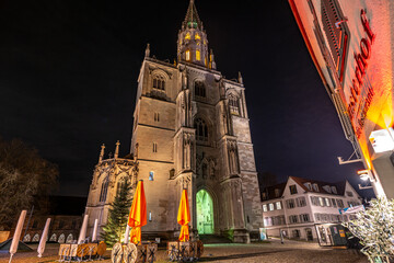 Illuminated cathedral &ldquo;M&uuml;nster unserer lieben Frau&rdquo; (Cathedral of Our Lady), photographed from the front at night. Konstanz, Baden-W&uuml;rttemberg, Germany.