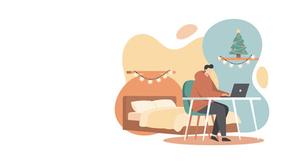 Man working from home on a laptop during the festive season in a cozy decorated bedroom