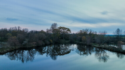 Drone landscape of a peaceful lake in the forest