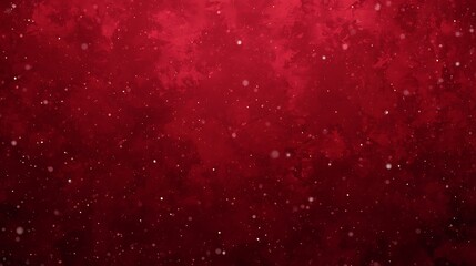 Deep red abstract textured background with sparkling white particles floating like snow for a festive holiday or Christmas celebration