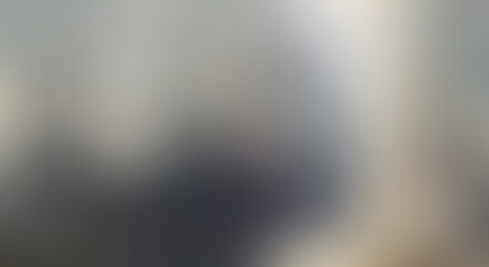 Abstract metallic surface texture with a smooth gradient and motion blur effect, featuring light silver, gray, and beige tones for a clean background