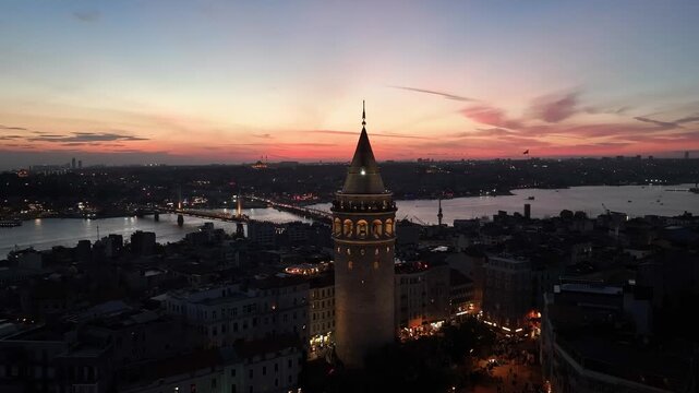 Galata Tower in the Sunset Drone Video, Istanbul Silhouettes Background, Galata Beyoglu, Istanbul, T&uuml;rkiye (Turkey)