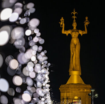 During the Christmas season, the pier leading to the famous Imperia statue in the harbour is adorned with sparkling Christmas lights. Constance, Baden-W&uuml;rttemberg, Germany.