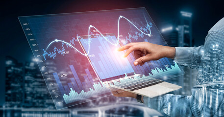 A businessman uses a futuristic laptop interface to analyze digital financial data and market trends in a vibrant urban setting at night, showcasing technology impact on finance. Scalp