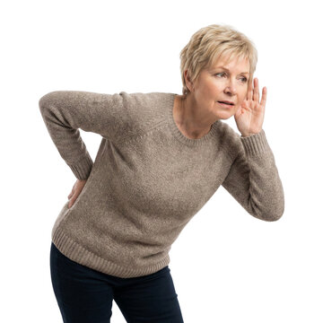 senior woman holding hand to ear struggling to hear on Isolated transparent background png. generated with AI