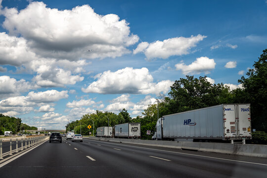 Manassas, USA - May 24, 2025: Virginia interstate highway road i-66 with semi truck trailers fleet rest area by express toll lanes, cars in traffic