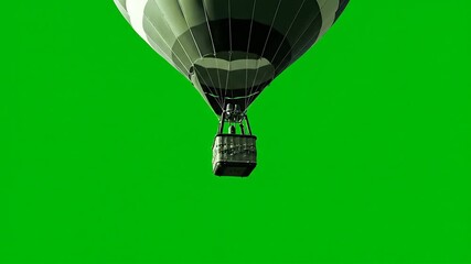 Majestic Hot Air Balloon Ascending Against a Vibrant Green Screen Backdrop A Versatile Visual Asset for Compositing and Special Effects Ideal for Travel Adventure and Celebration Themes.