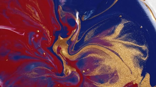 Multicolor Abstract Swirls &ndash; Vibrant red, blue, and gold ink merging and twisting in slow motion against a bright white canvas