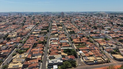 Obraz premium Aerial View of Urban Residential Area with Red-Tiled Roofs