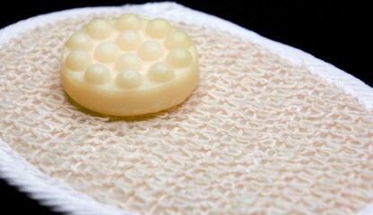 Bath soapy sponge on white background