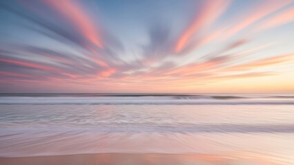 Obraz premium Vibrant sunset over tranquil ocean waves with colorful skies