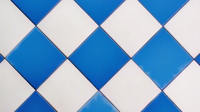 Video A blue and white tiled wall with a red fire hydrant in the center