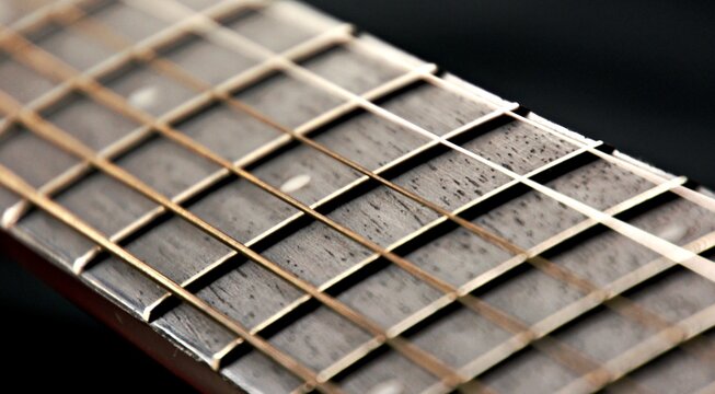 Guitar Strings, close up. Acoustic guitar. Black and white photography.