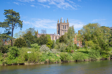 Obraz premium Hereford Cathedral viewed across the River Wye on Easter Sunday, Hereford, Herefordshire, England UK
