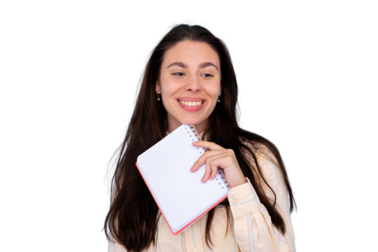 Young woman smiling, holding a small blank notebook, thinking new ideas, student planning and organizing studying