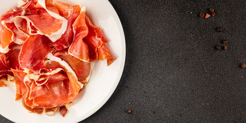jamon serrano meat appetizer jamon iberico natural product tasty snack fresh delicious gourmet food background on the table rustic top view copy space
