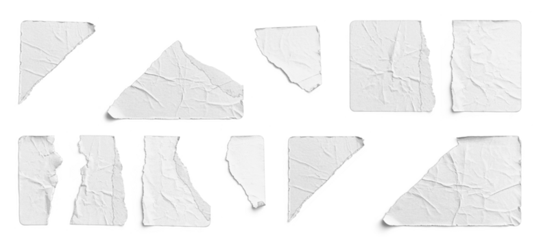 Torn White Stickers Assorted Pieces and Fragments