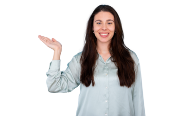 Young smiling woman presenting, showing and welcoming with open hand gesture, offering copy space