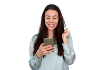 Happy young woman joyfully celebrating success reading good news on smartphone, showing excitement with fist pump