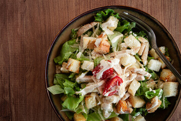 classic Caesar salad, close-up, natural light, selective focus, horizontal,