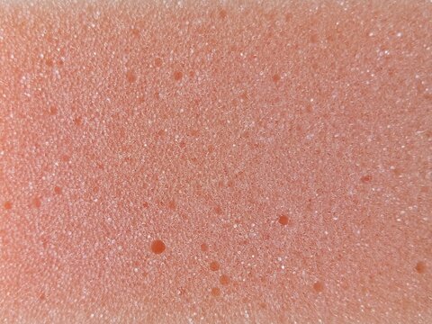 Pink porous foam texture close-up