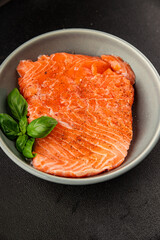 Salmon fillet raw red fish seafood dish natural tasty snack fresh delicious gourmet food background on the table rustic top view copy space pescetarian diet
