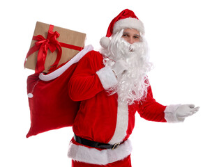 Santa Claus with bag full of gifts showing something on white background. Merry Christmas and Happy New Year
