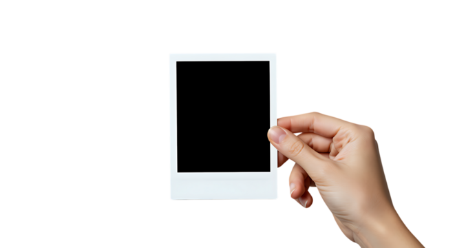 A hand holding a blank instant photo offering versatile design possibilities on transparent background.