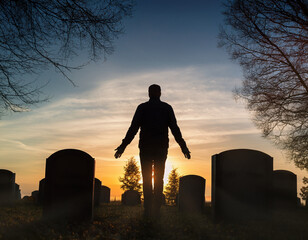 Silhouette of a Man Walking from grave  Gravestone. Resurrection, lİfeafter death   concept