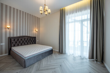 Modern Home Bedroom Interior with Striped Walls and Elegant Curtains