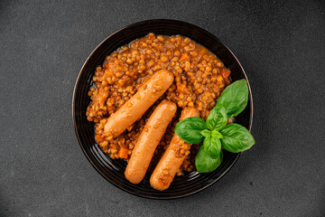 Sausage with lentils second course tasty snack fresh delicious gourmet food background on the table rustic top view copy space