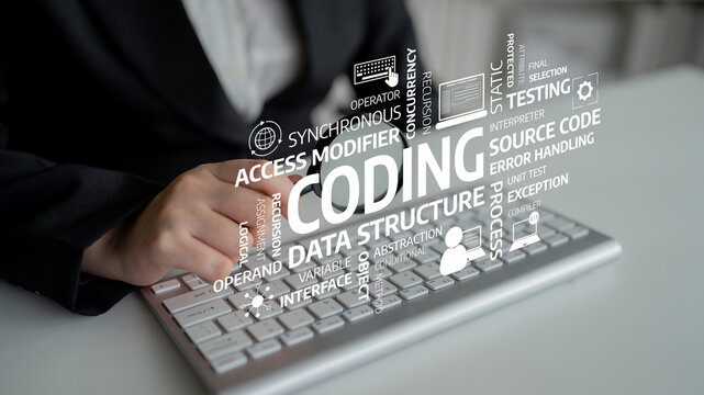 Focused individual typing on a keyboard with programming terms floating around, symbolizing the dynamic nature of coding in today tech-driven workspace. Tessel