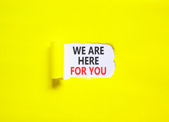 Support, help and we are here for you symbol. Concept words We are here for you on beautiful white paper. Beautiful yellow paper background. Business we are here for you concept. Copy space.