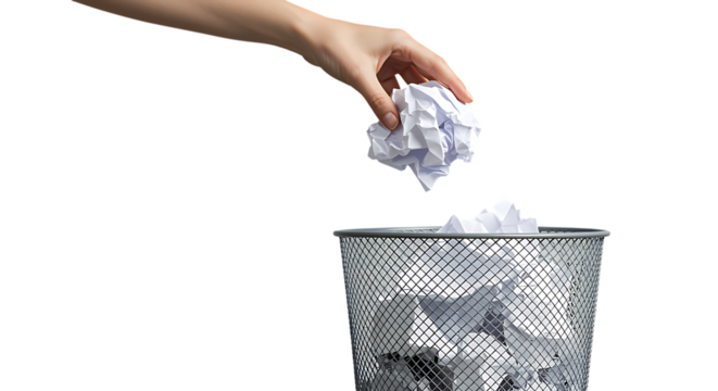 Hand dropping crumpled paper into a metallic wastebasket on transparent background.