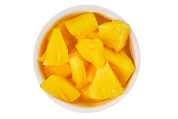 Pineapple canned chunks sweet fruit dessert tasty snack fresh delicious gourmet food background on the table rustic top view copy space keto and paleo diet vegetarian and vegan food