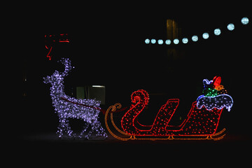 Colorful Christmas lights and decorations in park Dardin in Split, Croatia. December night in the park.