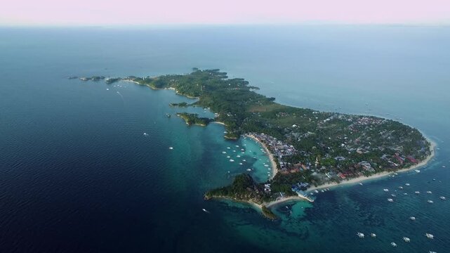Malapascua Island Seashore in Cebu, Philippines. Sulu Sea, Boats and Beautiful Seascape in Background. Drone
