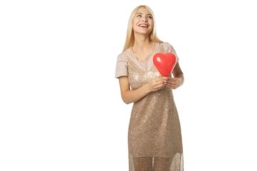 Smiling girl with red heart balloon