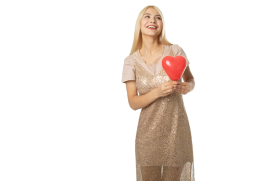 Smiling girl with red heart balloon